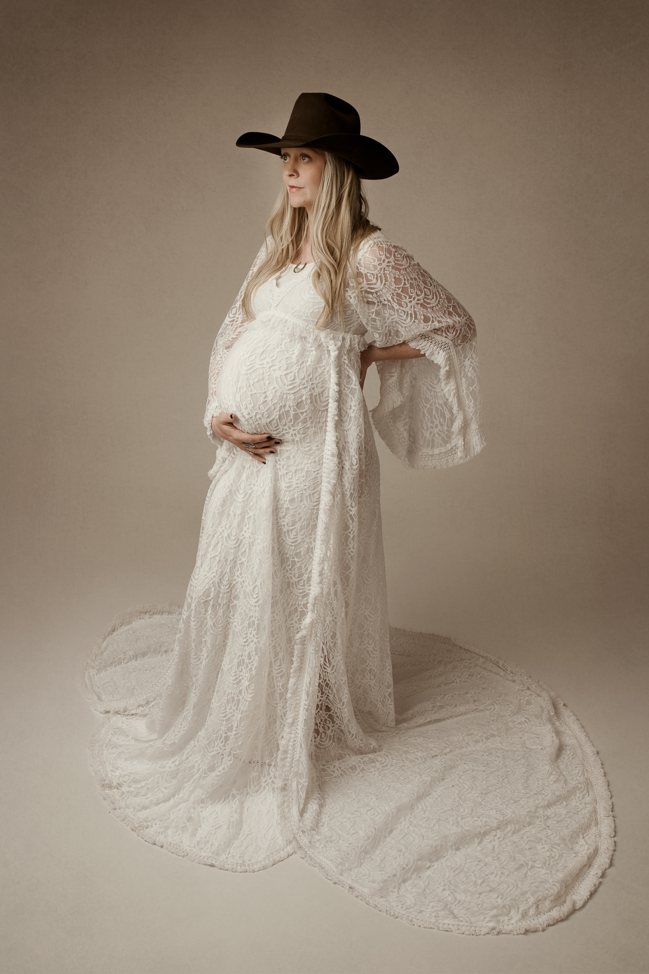 mam to be in white bohemian maternity gown Sky Lakes Birthing Center